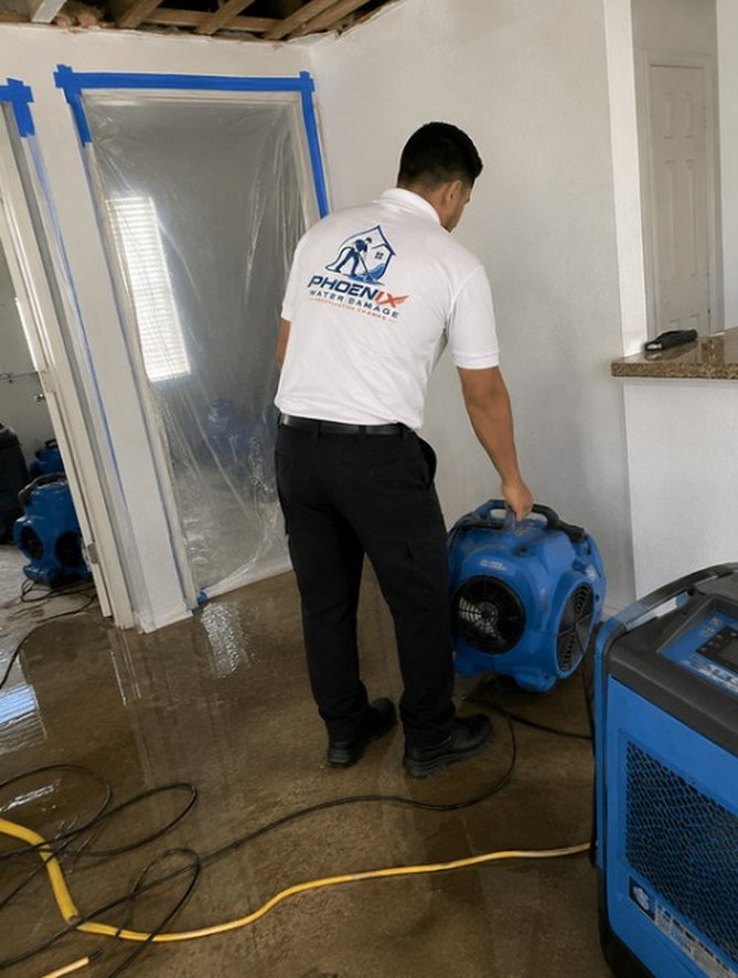 Phoenix Water Damage Restoration Champs drying equipment set up on a job